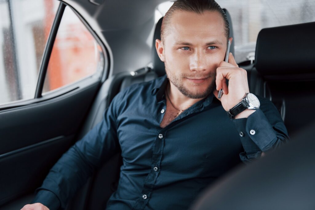 6 Reasons Why Limo's are Perfect to take for Business Meetings - a modern businessman speaks on the phone in the ba 2021 08 29 14 51 48 utc , business meetings