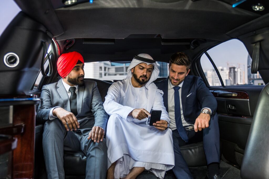 6 Advantages of Taking a Limo to the Airport - multi ethnic business team meeting 2021 09 01 16 48 18 utc , taking a limo
